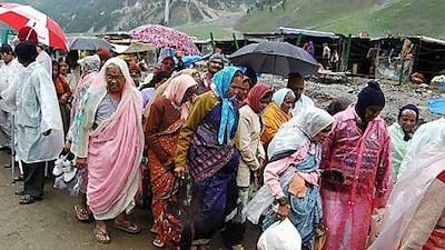 A group of female pilgrims starts a journey to the Amarnath cave-temple 3,900 metres up from the Baltal base camp.