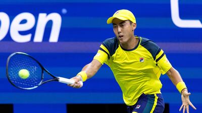 Australia's Rinky Hijikata hits a return against Spain's Rafael Nadal. AFP