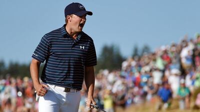 Jordan Spieth celebrates a birdie putt during the final round of the US Open on Sunday at Chambers Bay. Ross Kinnaird / Getty Images / AFP / June 21, 2015