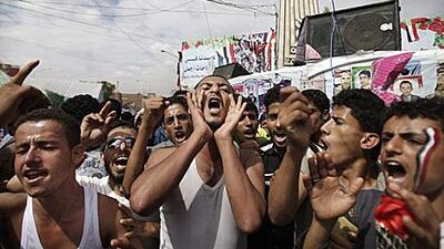 Yemeni protestors chant slogans during a demonstration against President Ali Abdullah Saleh's deal which will give him immunity from prosecution.