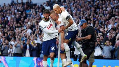 Tottenham's Eric Dier celebrates with team-mates after scoring their second goal. PA