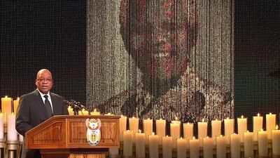A screengrab taken from the South African Broadcasting Corporation live feed shows South Africa President Jacob Zuma speaking during the funeral service. SABC / AFP Photo