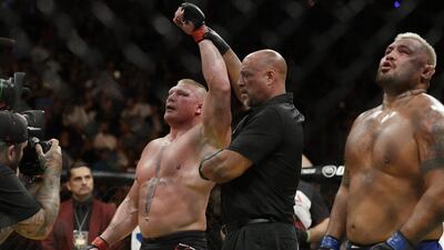 Brock Lesnar celebrates after defeating Mark Hunt in a heavyweight bout at UFC 200, Saturday, July 9, 2016, in Las Vegas. John Locher / AP Photo