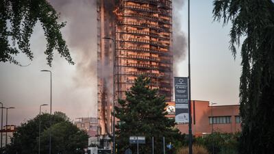 Heavy smoke from an apartment block in Via Antonini, in the southern suburbs of Milan, Italy. EPA