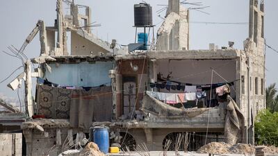 Bomb damaged homes still scar the landscape with some families still living in the dangerously unstable buildings that scar Gaza. Christopher Furlong / Getty Images