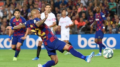 Barcelona's Chilean midfielder Arturo Vidal scores a goal. AFP