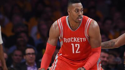 Dwight Howard is averaging 20 points and 11.3 rebounds per game for the Rockets this season. Robyn Beck / AFP