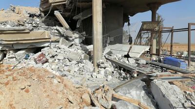 The destroyed headquarters of Kataib Hezbollah in Qaim. Reuters