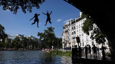 A portion of Paris’s Canal Saint-Martin has been opened for swimming as a heatwave sweeps across France. AFP