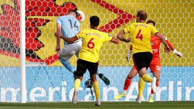 Manchester City's Aymeric Laporte, left, scores his side's fourth goal. AP