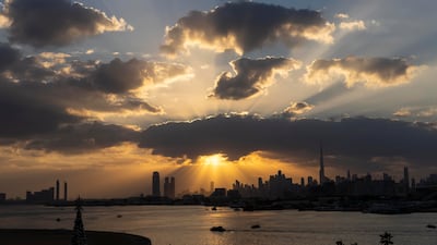 The sun sets over Dubai for the last time in 2025. Antonie Robertson / The National