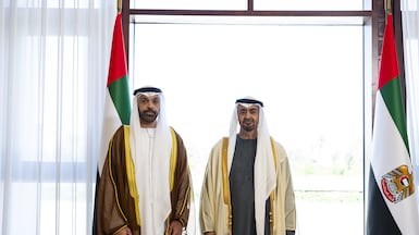 President Sheikh Mohamed with Mohamed Ahmed Al Qamzi, UAE ambassador to the Association of South Asian Nations. Abdulla Al Bedwawi / UAE Presidential Court