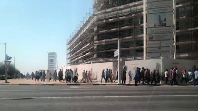 Workers on Reem Island left the construction site on Tuesday in protest at having not been paid. Mina Aldroubi / The National