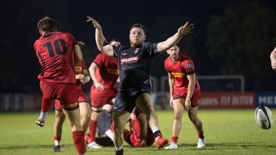 Action from the game between Bahrain, in red, and Dubai Exiles.
