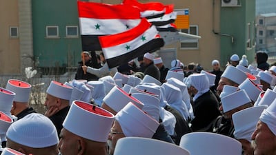 Druze residents of the Golan Heights take part in a rally in the village of Majdal Shams in the Israeli-annexed Golan Heights to protest against the 1981 Israeli annexation law of the strategic plateau which the Jewish state captured from Syria during the 1967 Arab-Israeli war. AFP