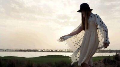 Dress, Fendi. Hat, as before. Scarf, Tsumori Chisato at IF Boutique