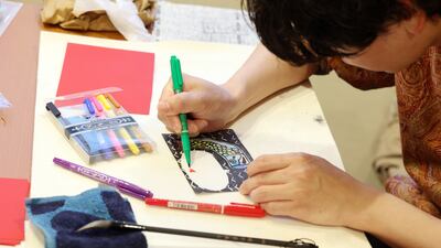 A printing workshop. Palestinians in Japan hold a fundrasing and awareness event at the Palestine embassy. Tokyo, Japan. Chris Whiteoak / The National