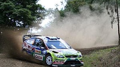 Mikko Hirvonen throws his Ford around a corner during the Rally Australia.