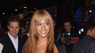 Beyonce, in a classic LBD, attends 'The Fighting Temptations' premiere at The Empire Leicester Square on November 12, 2003 in London. Getty Images