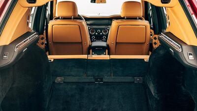 The electrically folding rear seats don’t lie flat, but the boot floor rises to create a seamless ramp to the front seats. Rolls-Royce