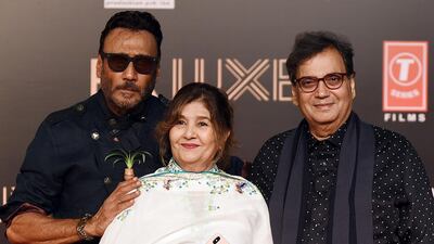 Bollywood actor Jackie Shroff, left, film director Subhash Ghai, right, with his wife Elsa George known as Mukta, centre, attend the premiere of Hindi film 'Bharat' in Mumbai on June 4, 2019. AFP