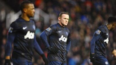 Wayne Rooney and Manchester United are seventh in the Premier League, 15 points behind leaders Arsenal. Laurence Griffiths / Getty Images