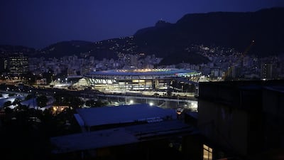 Maracana stadium is seen on May 21, 2014 from Mangueira slum before the last Brazilian league football match between Fluminense and Sao Paulo before the 2014 World Cup starts on June 12. Hassan Ammar / AP Maracana