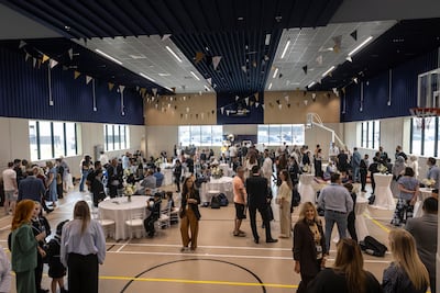Families gathered in the school's multi-purpose hall on Monday morning. Antonie Robertson / The National