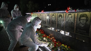Candles are lit at a memorial for Chernobyl victims, marking the 40th anniversary of the explosion at the plant, the worst civilian nuclear disaster in history. AFP