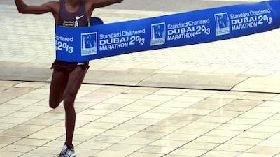 Lelisa Desisa Benti of Ethiopia crosses the finish line to win the Standard Chartered Dubai Marathon in Dubai.
