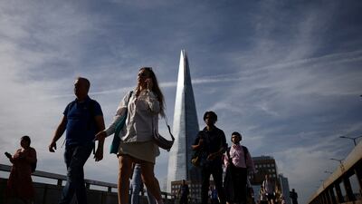 Commuters on London Bridge. The UK unemployment rate rose to 3.7 per cent in the three months to November. Reuters