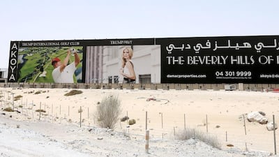 The advertisement of Akoya by Damac near Arabian Ranches in Dubai featuring Donald Trump. Pawan Singh / The National