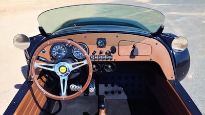 The thin-rimmed wooden steering wheel can be slippery if your palms get sweaty, so grip it with sufficient pressure.