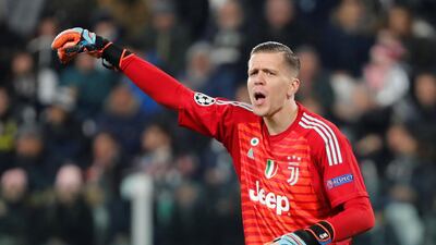 Juventus goalkeeper Wojciech Szczesny gestures during the match. Reuters