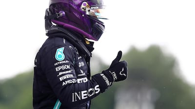 Lewis Hamilton celebrates after qualifying in pole position for the Hungarian Grand Prix. Reuters