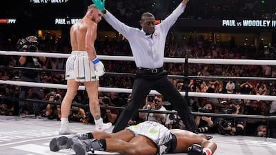 Jake Paul looks back after knocking out Tyron Woodley during the sixth round of their cruiserweight fight in Tampa. AP