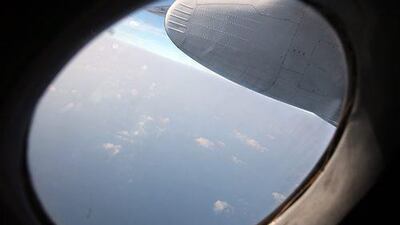 A handout picture provided by Petrotimes shows military personnel inside a Vietnamese Air Force plane during search and rescue operation. EPA