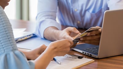 A bank's terms and conditions make reference to fees and these are assumed to be accepted when any person signs the paperwork to open an account. Getty Images