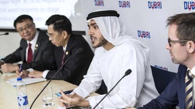 From left: Kai Tu, vice chairman of the International Dragon Award 2015 Annual Meeting, Richard Wu, chairman of the IDA 2015 Annual Meeting, Issam Kazim, chief executive of Dubai Tourism, and Steen Jakobsen, the director of Dubai Business Events, make the announcement in Dubai yesterday, August 19. Antonie Robertson / The National