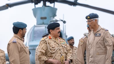 King Hamad, centre, on a visit to meet members of the Bahraini air force. Photo: Bahrain News Agency