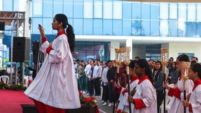 The procession during Christmas Day Mass at St Joseph’s Cathedral in Abu Dhabi. Victor Besa / The National