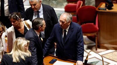 French Prime Minister Francois Bayrou, right, lost a no-confidence vote on Monday. Reuters