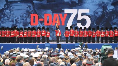 Guardsmen parade on stage during an event to commemorate the 75th anniversary of the D-Day landings, in Portsmouth, southern England. AFP