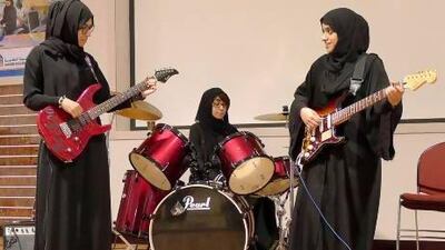 Members of the Al Ain-based rock band Random Stars are, left to right: Bushra Hassan Al Hashimi, 22, rhythm guitar, Aysha Abdullah Almaskari, 21, drums, and Hamda Al Ghaithi, 22, lead guitar. Photo courtesy Patreshia Tkach