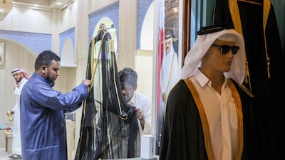 Al-Salem store in Doha's Souq Waqif supplied the bisht worn by Lionel Messi after the World Cup final. AFP