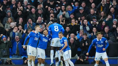 Everton players celebrate after Everton's Abdoulaye Doucoure's opening goal. AP