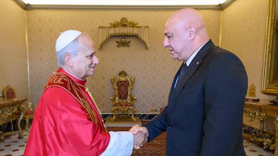 Pope Leo XIV greets Lebanese President Joseph Aoun during a private audience at the Vatican. Vatican Media / AFP