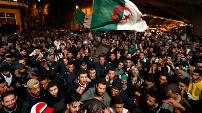 A crowd celebrates after ailing Algerian President Abdelaziz Bouteflika resigned. AP Photo