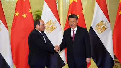 epa07527786 Chinese President Xi Jinping (R) shakes hands with Egypt President Abdel Fattah El-Sisi (L) before a bilateral meeting during the Second Belt and Road Forum at the Great Hall of the People n Beijing, China, 25 April 2019. Leaders from 37 countries have been converging in Beijing for the Belt and Road Forum on 25 April. EPA/ANDREA VERDELLI / POOL