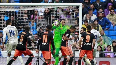 Goalkeeper Keylor Navas of Real Madrid stops the ball against Valencia. Gonzalo Arroyo Moreno / Getty Images